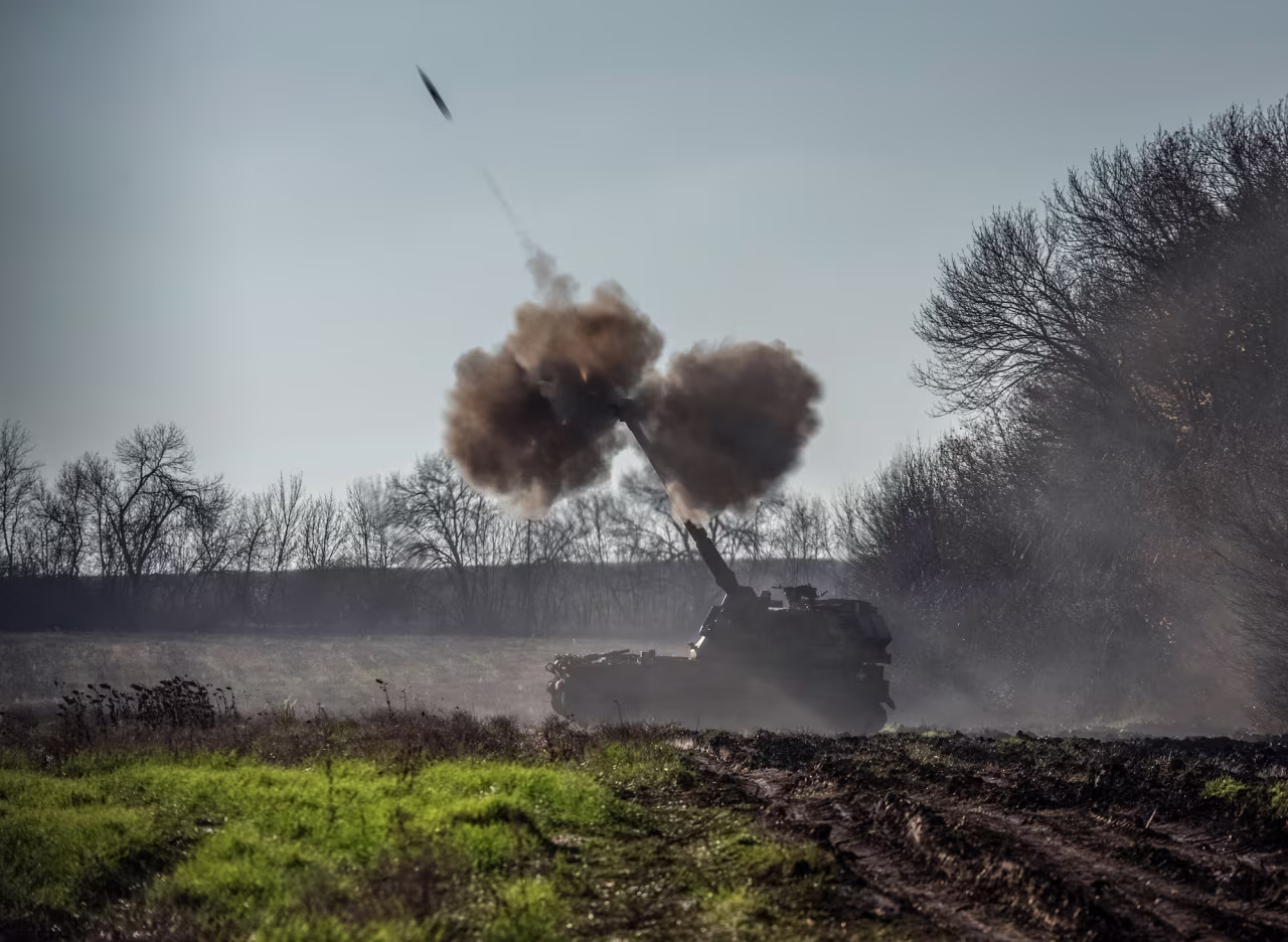 Ukrainian forces fire a howitzer round toward Russian positions in the Donetsk Oblast on Tuesday.