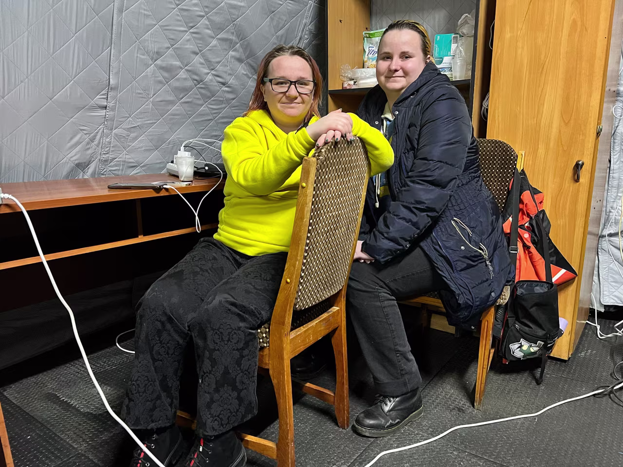 Tetiana, left, and Larysa inside an Invincibility Point in Kyiv, Ukraine. 