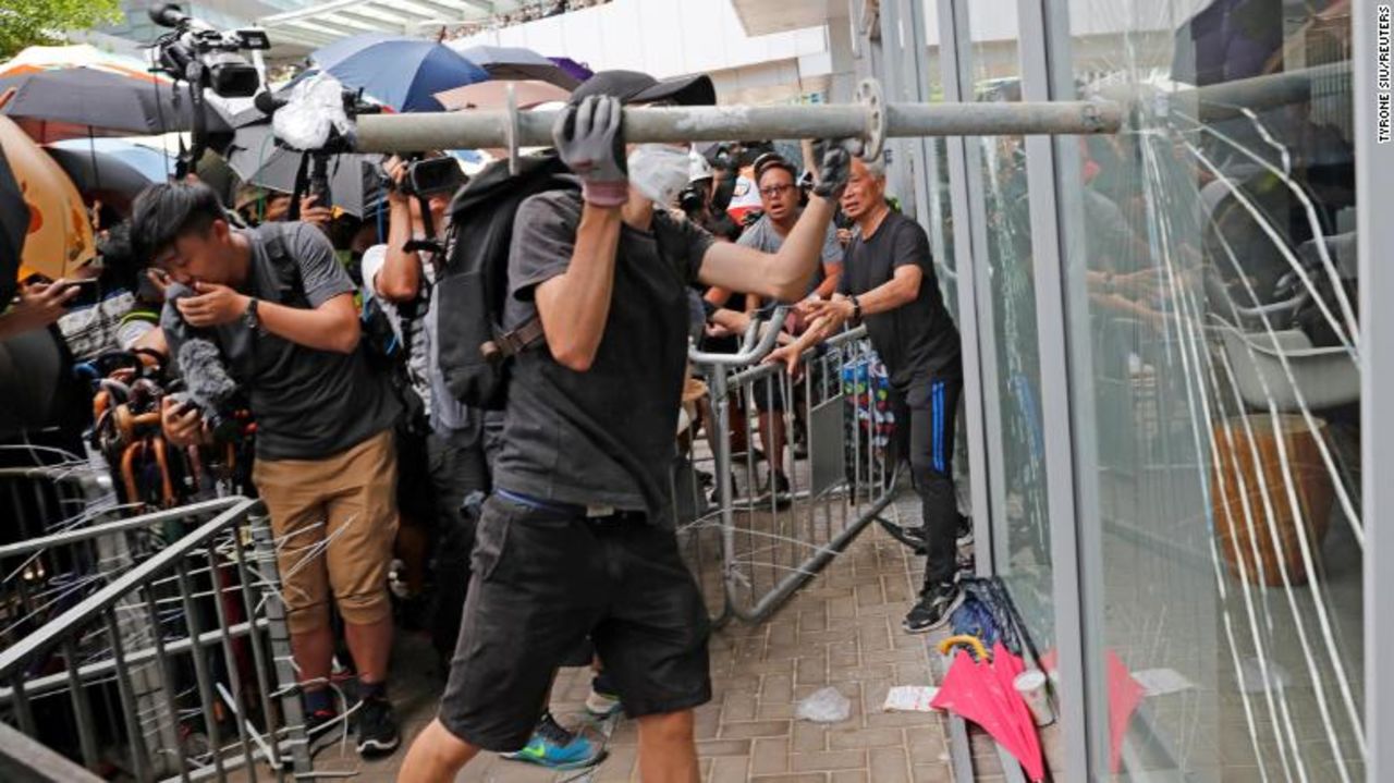 Protesters trying to break into the Legislative Council building in Hong Kong.