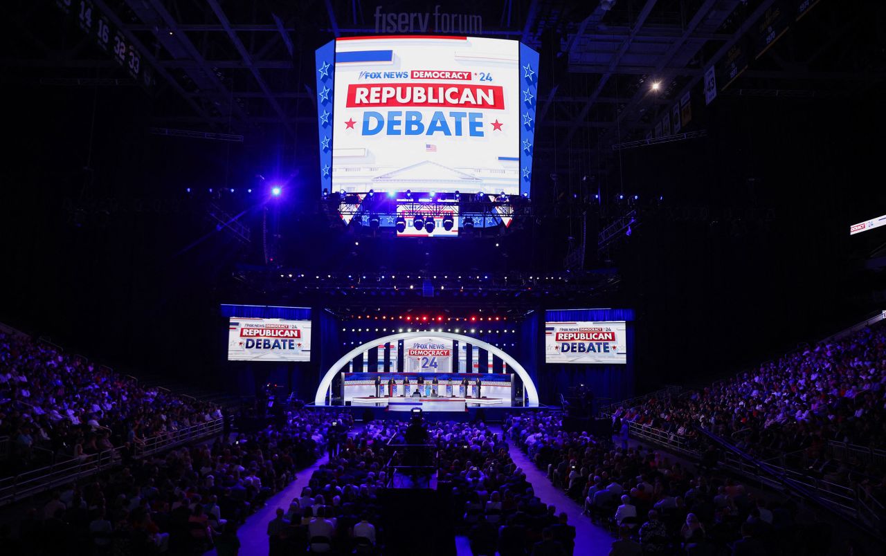 Former Arkansas Gov. Asa Hutchinson, former New Jersey Gov. Chris Christie, former Vice President Mike Pence, Florida Gov. Ron DeSantis, Vivek Ramaswamy, former South Carolina Gov. Nikki Haley, Sen. Tim Scott and North Dakota Gov. Doug Burgum stand at their podiums at the first Republican candidates' debate of the 2024 U.S. presidential campaign in Milwaukee, Wisconsin on Wednesday.