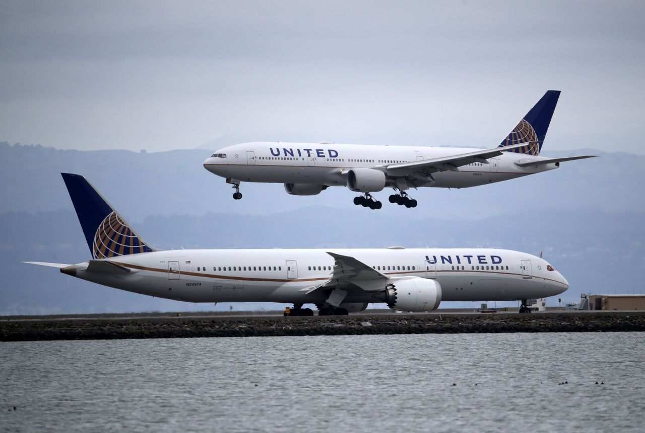 A United Airlines plane lands at San Francisco International Airport on March 6 in California.