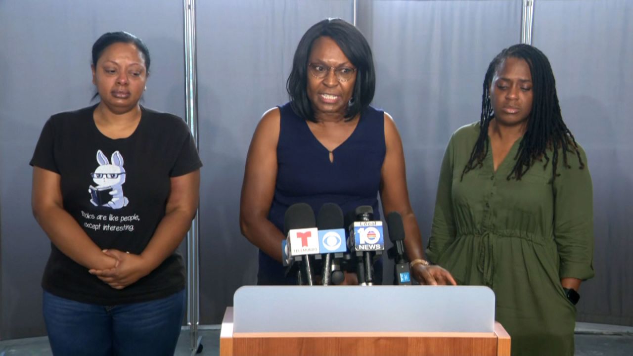 Anne Ramsay, center, speaks at a press conference on Thursday, October 13. 