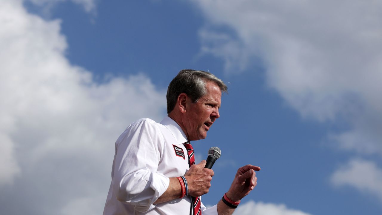 Gov. Brian Kemp speaks to voters during a campaign stop at Williamson Brothers Bar-B-Q on November 3, 2022 in Marietta, Georgia. 