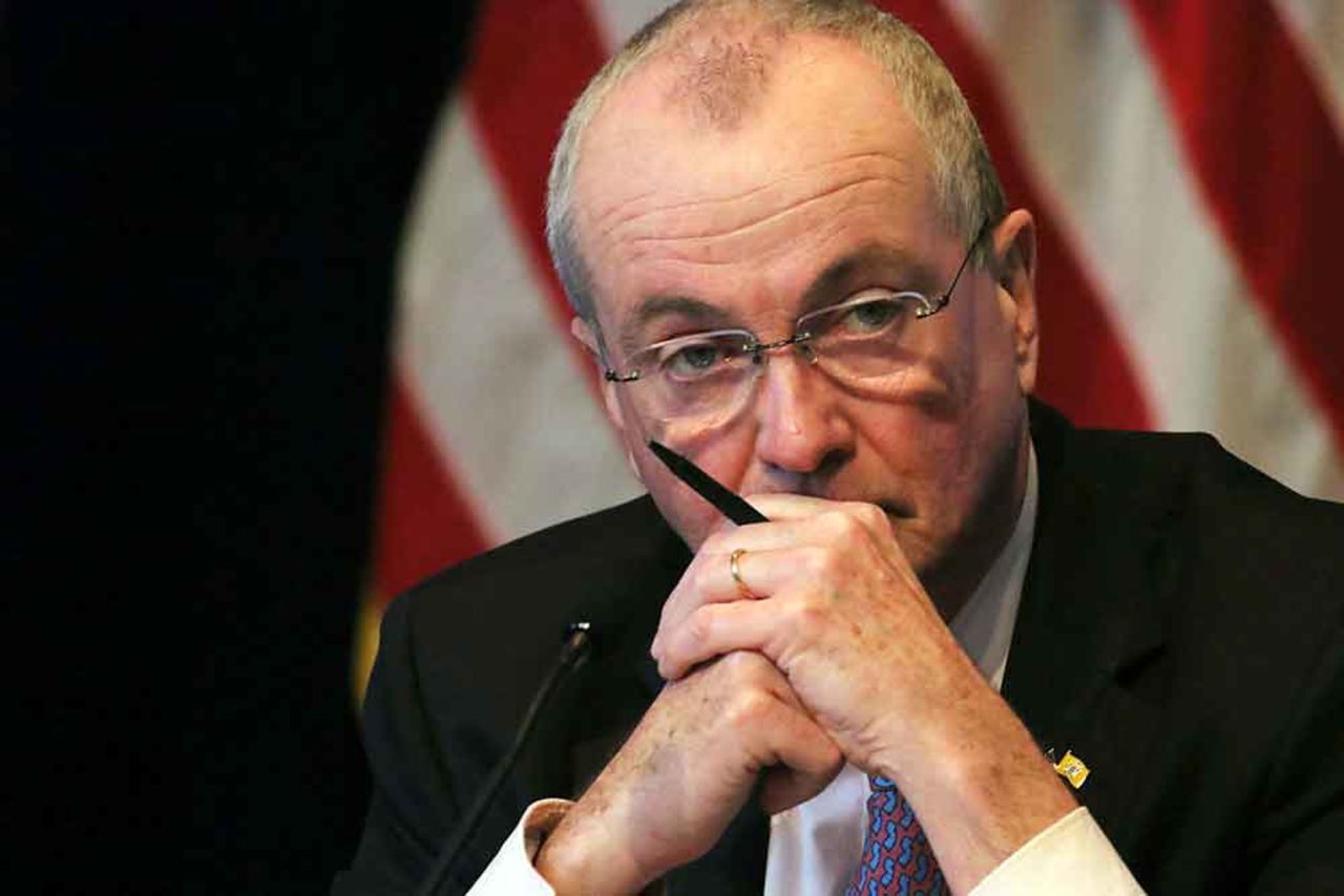 New Jersey Gov. Phil Murphy listens during a coronavirus news conference at the War Memorial in Trenton, New Jersey, on May 19.