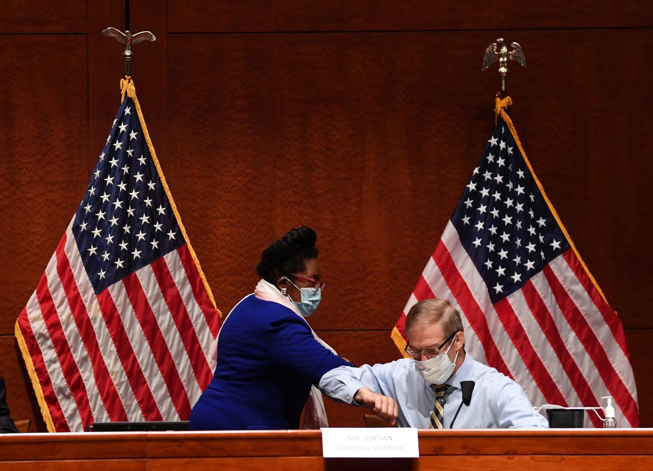 Rep. Sheila Jackson Lee (D-TX) and Rep. Jim Jordan (R-OH) greet by bumping elbows at a House Judiciary Committee markup of H.R. 7120, the "Justice in Policing Act of 2020," on Capitol Hill on June 17.