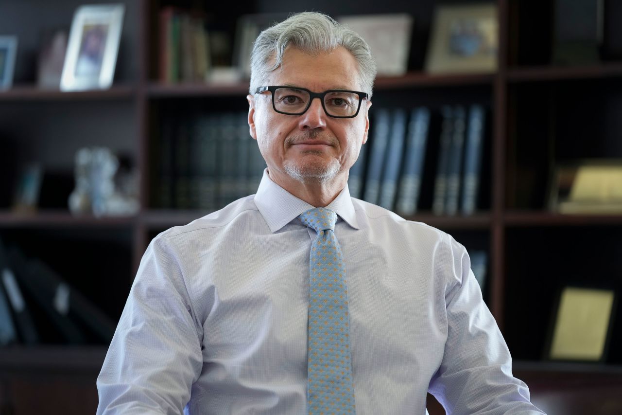 Judge Juan Merchan poses for a picture in his chambers in New York on March 14.