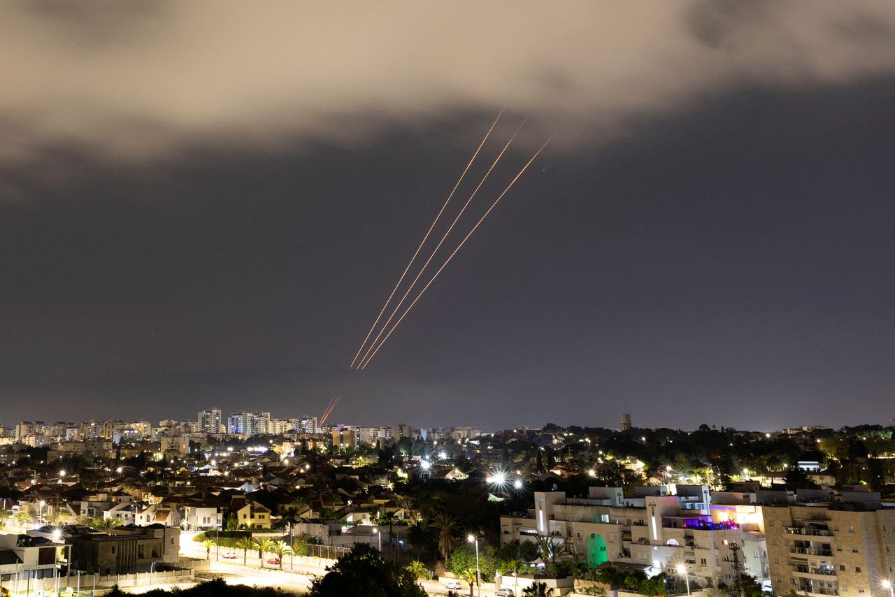 An anti-missile system operates after Iran launched drones and missiles toward Israel, as seen from Ashkelon, Israel, on April 14.