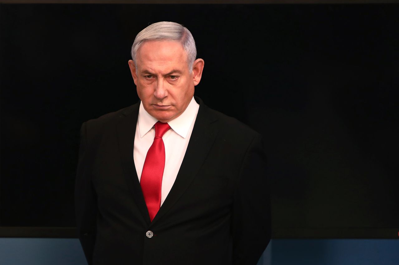 Israeli Prime Minister Benjamin Netanyahu arrives for a speech at his Jerusalem office on March 14.