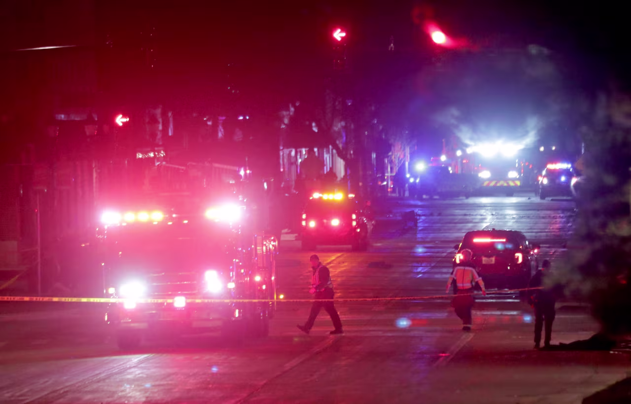 Police investigate at the scene of a holiday parade in Waukesha, Wisconsin, on November 21.