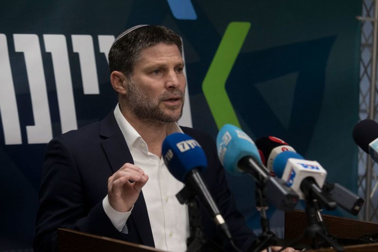 Israel’s Finance Minister Bezalel Smotrich speaks to the press on February 5, 2024, in Jerusalem. 