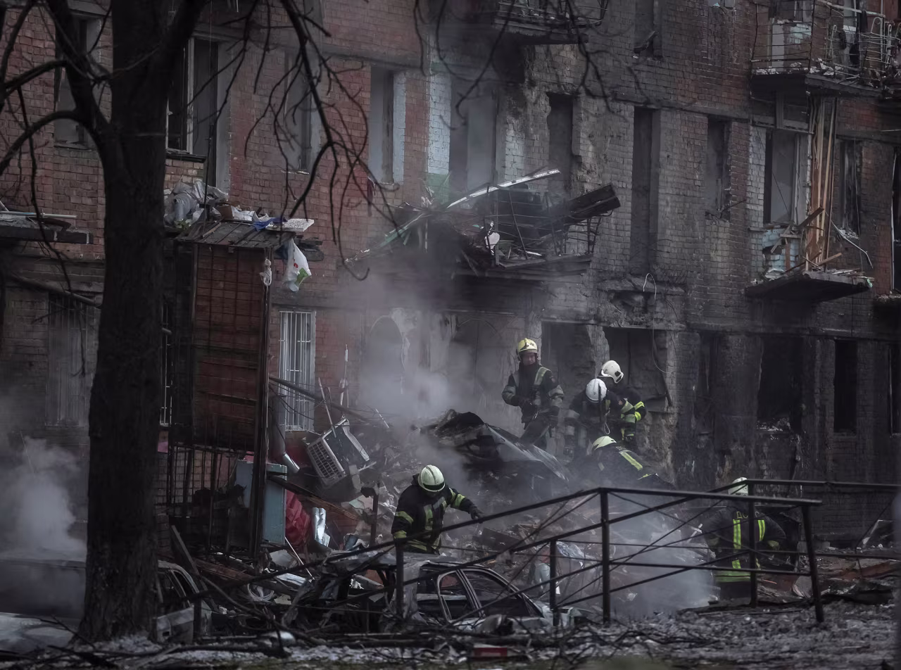 Rescuers work at a site of a residential building destroyed by a Russian missile attack in the suburb of Vyshhorod, Kyiv, on November 23.