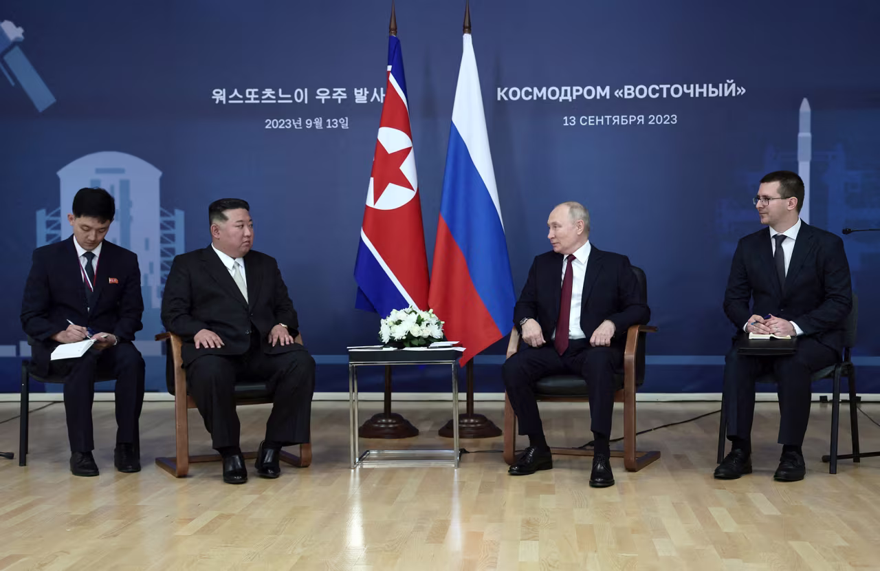Russia's President Vladimir Putin, second right, meets with North Korea's leader Kim Jong Un, second left, at the Vostochny Сosmodrome in the far eastern Amur region, Russia, on September 13.