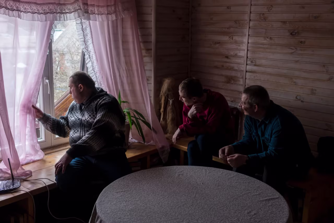Clients relax during an afternoon rest period at Djerela, an NGO focused on supporting families living with disabilities.