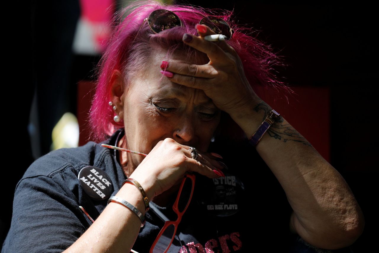 A person reacts outside Hennepin County Government Center in Minneapolis after Chauvin's sentencing.