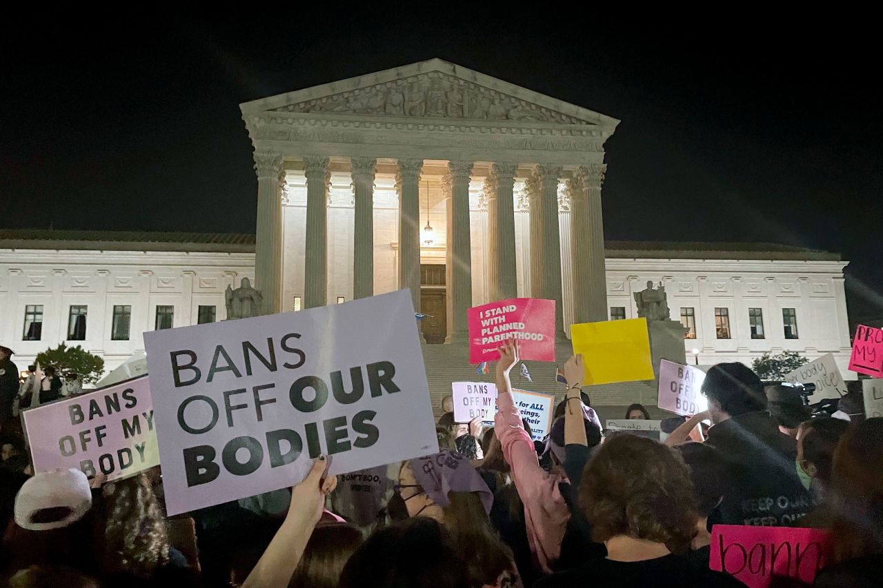 A crowd of people gather outside the Supreme Court on May 2.