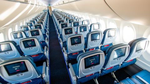 A photo of the interior of a Delta Air Lines Airbus A220 aircraft