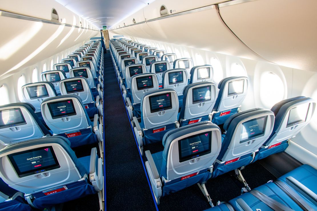 A photo of the interior of a Delta Air Lines Airbus A220 aircraft