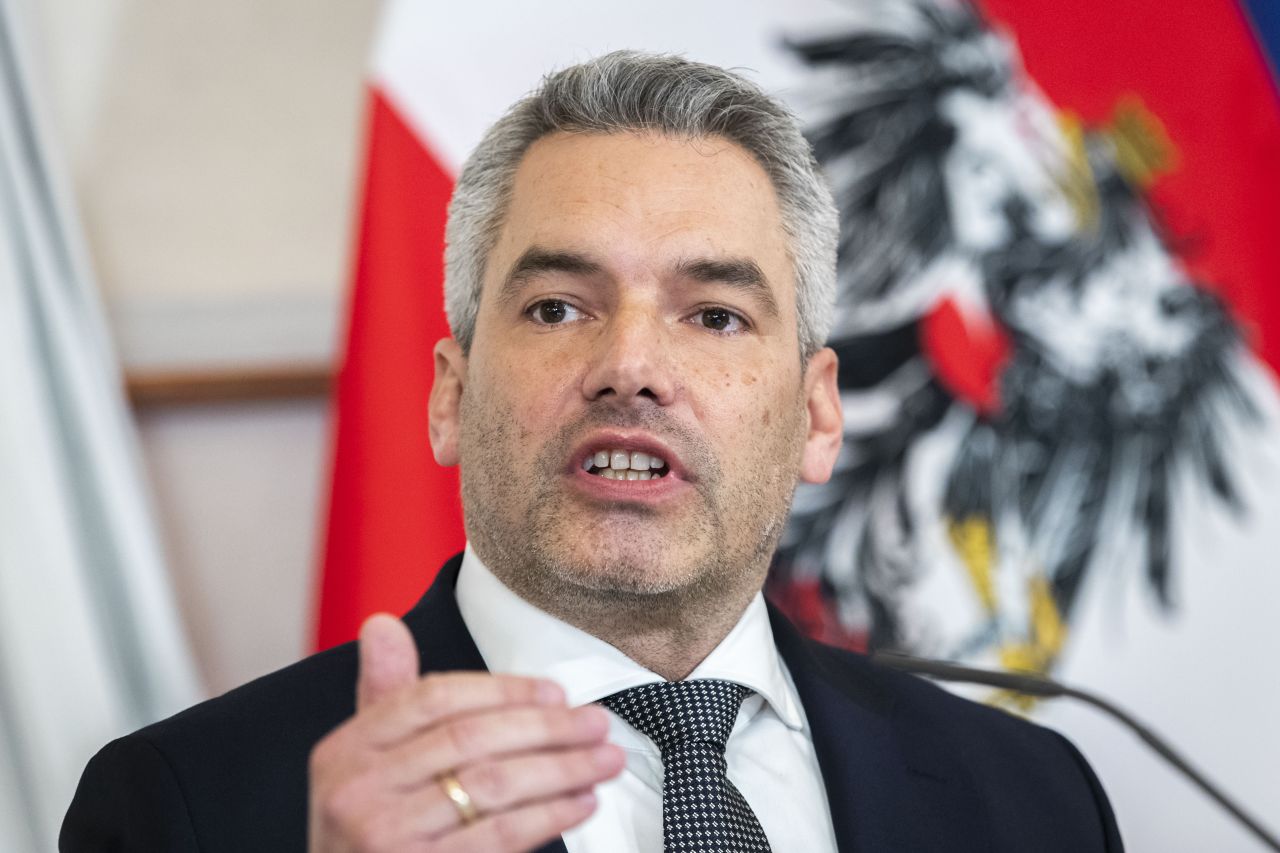 Austrian Chancellor Karl Nehammer presents the new COVID19- regulations at a press conference after a meeting of the federal government in Vienna, Austria, Thursday, Jan. 6, 2022. The new regulations will come into force on Monday, Jan. 10, 2022. 