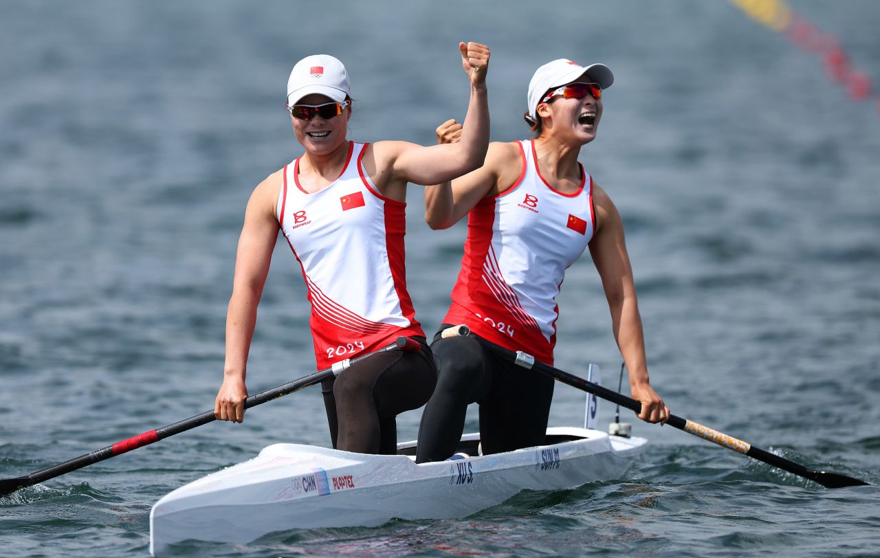 Xu Shixiao and Sun Mengya of China celebrate winning gold during the women's canoe double 500m final on August 9. 