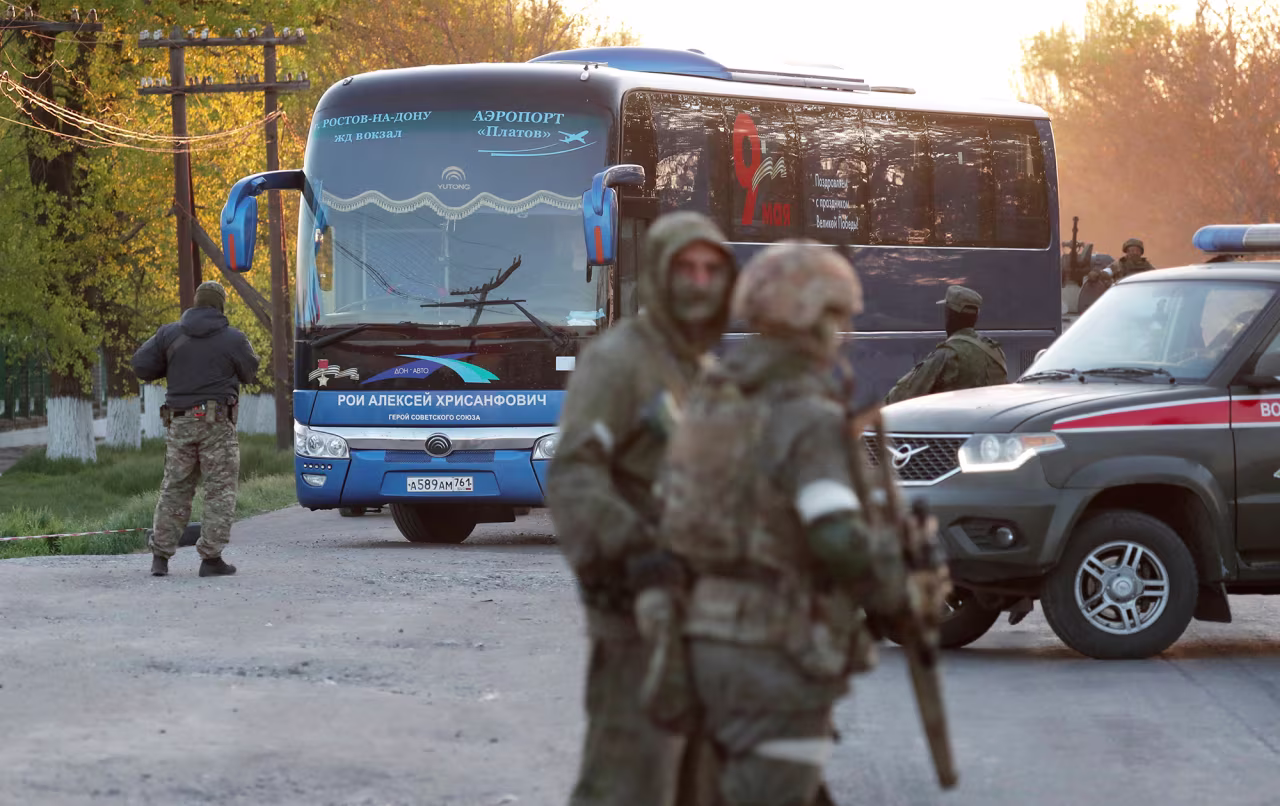 A bus carrying civilians evacuated from Azovstal steel plant in Mariupol arrives at a temporary accommodation center in the village of Bezimenne, Ukraine on May 6, 2022. 