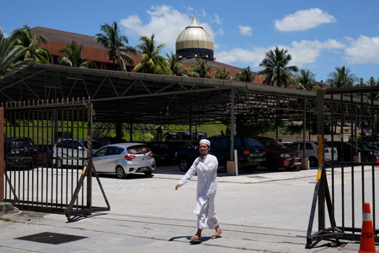 A man walks out from Seri Petaling Mosque in Kuala Lumpur, Malaysia, on Monday, March 16. 