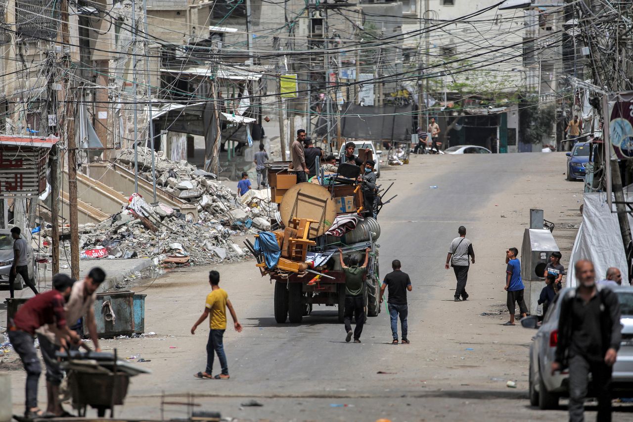 Palestinians evacuate Rafah, Gaza, with their belongings on May, 11. 