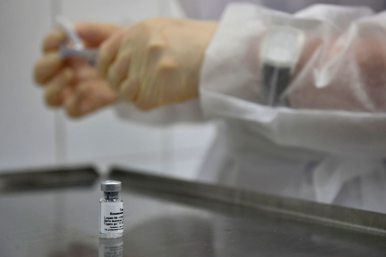 A nurse prepares to inoculate a volunteer with Russia's Sputnik V coronavirus vaccine in a post-registration trials at a clinic in Moscow on September 10.