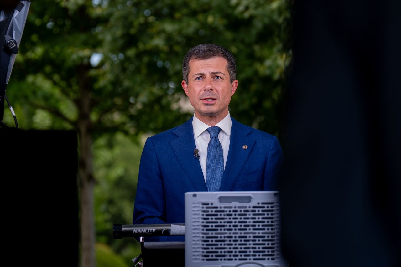 Transportation Secretary Pete Buttigieg speaks during an on camera interview on the North Lawn of the White House on July 23, in Washington, DC.