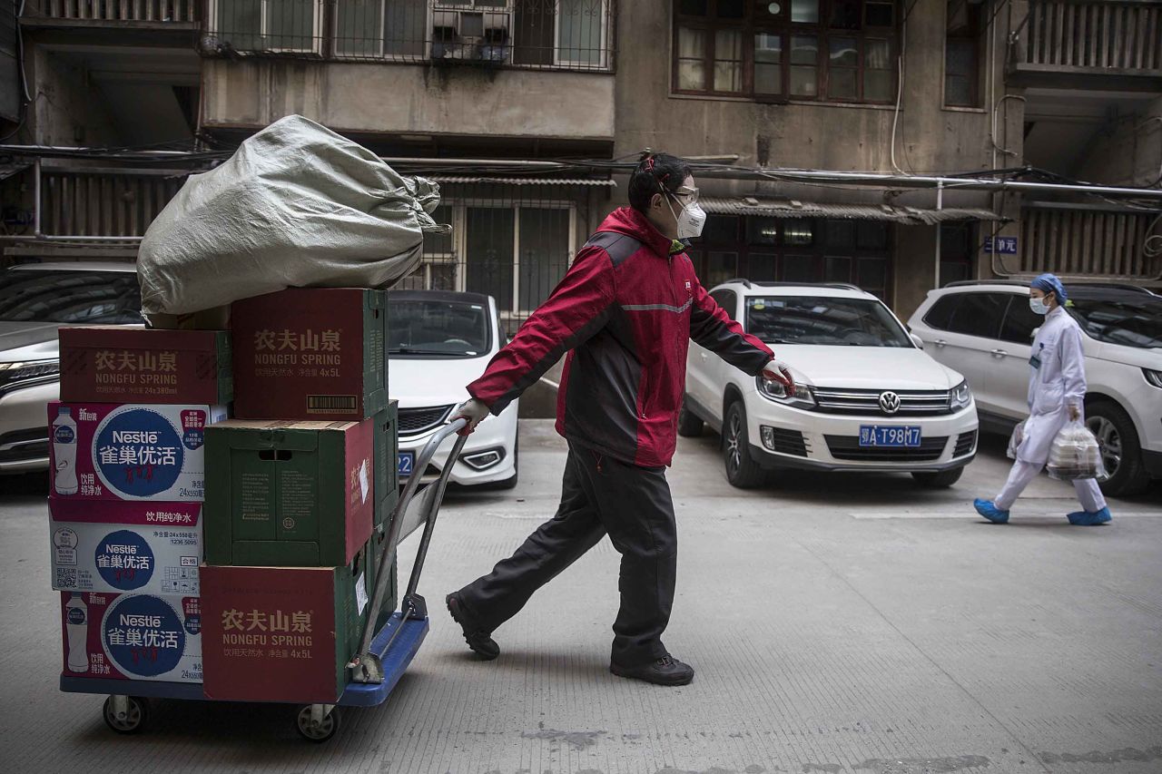 A courier delivers a shipment to Wuhan Union Hospital on January 29