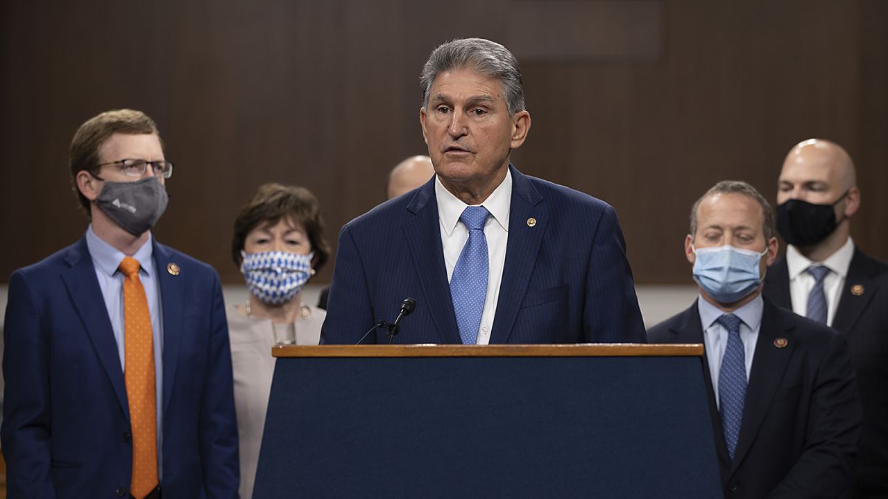 Sen. Joe Manchin speaks alongside a bipartisan group of Democrat and Republican members of Congress as they announce a proposal for a Covid-19 relief bill on Capitol Hill on December 1, in Washington.