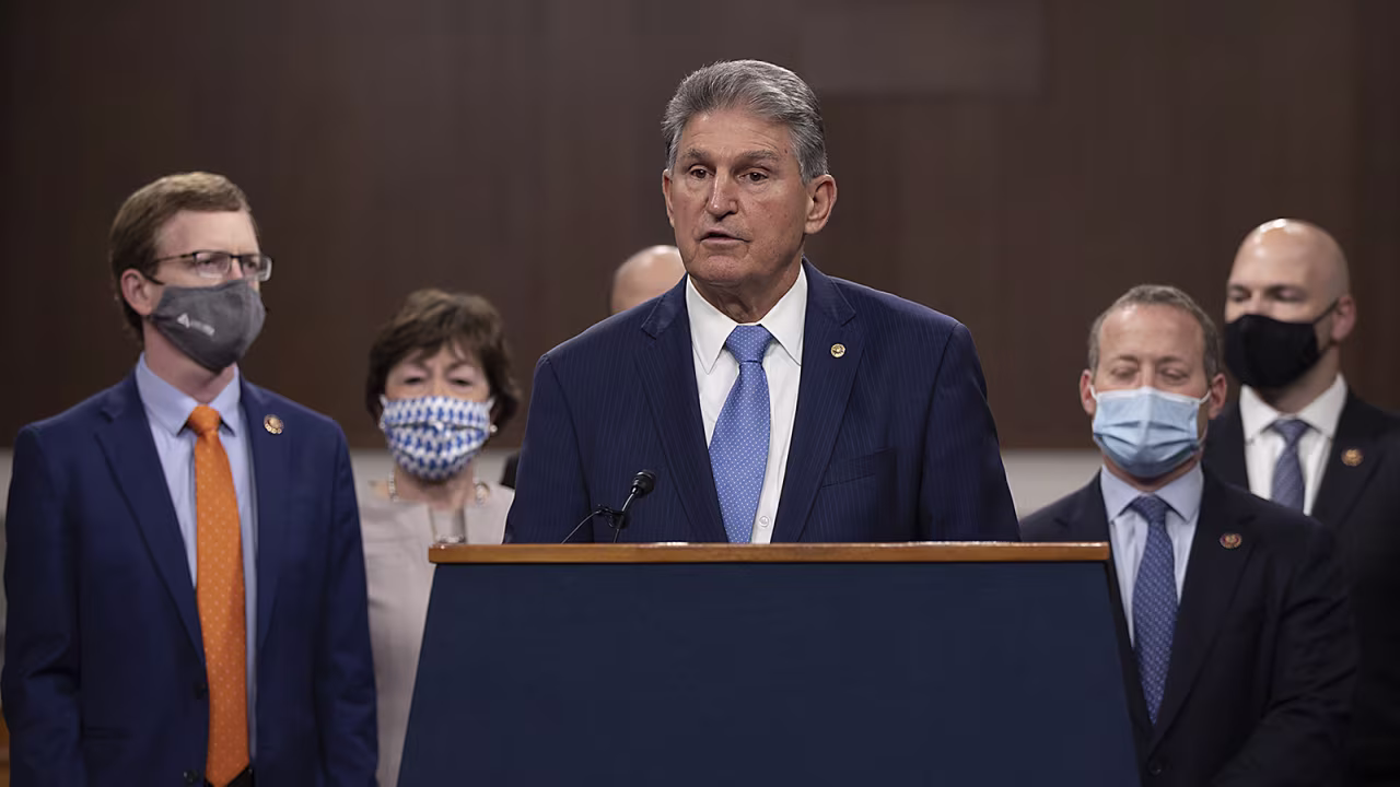 Sen. Joe Manchin speaks alongside a bipartisan group of Democrat and Republican members of Congress as they announce a proposal for a Covid-19 relief bill on Capitol Hill on December 1, in Washington.