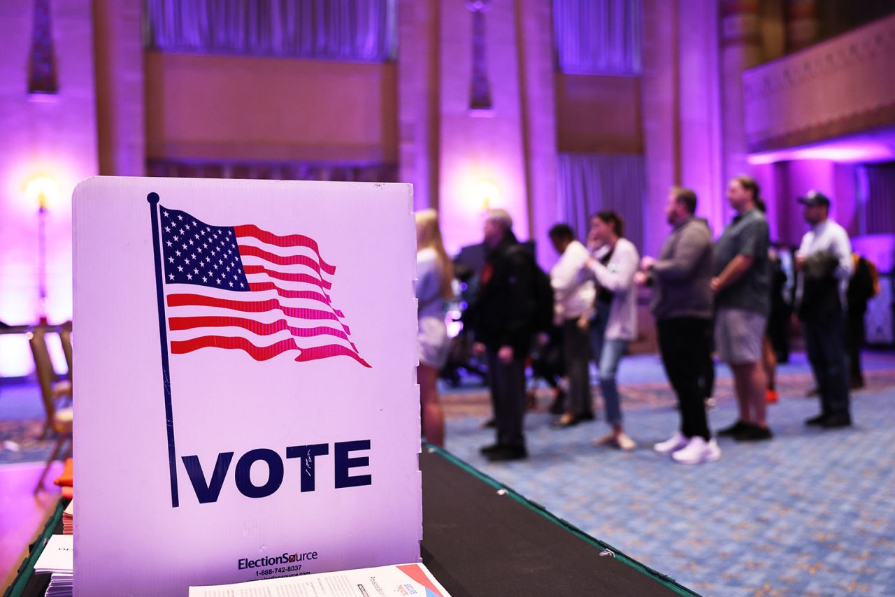 People wait in line to cast their ballot at Fox Theatre in Atlanta on Tuesday. 