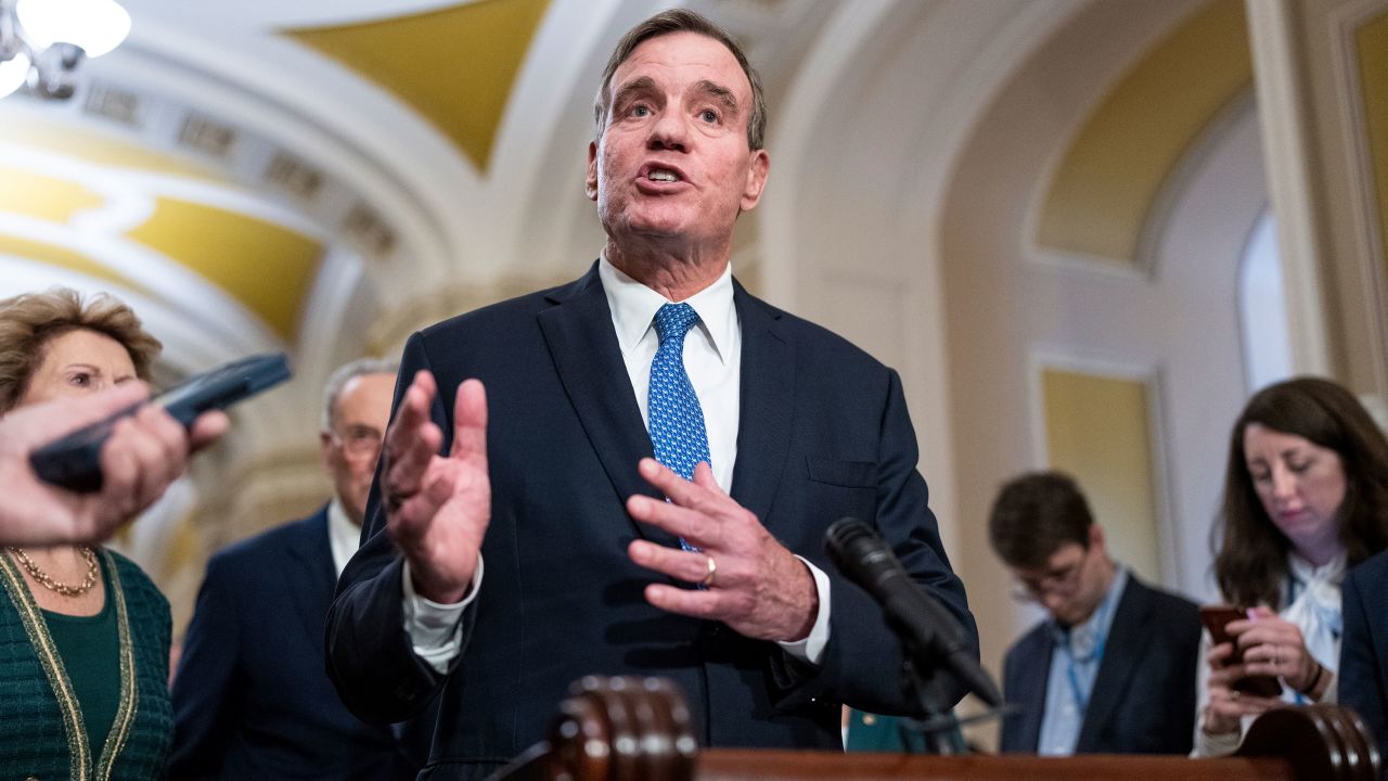 Democratic Sen. Mark Warner of Virginia speaks during a news conference at the Capitol in Washington, DC, on December 5, 2023. 