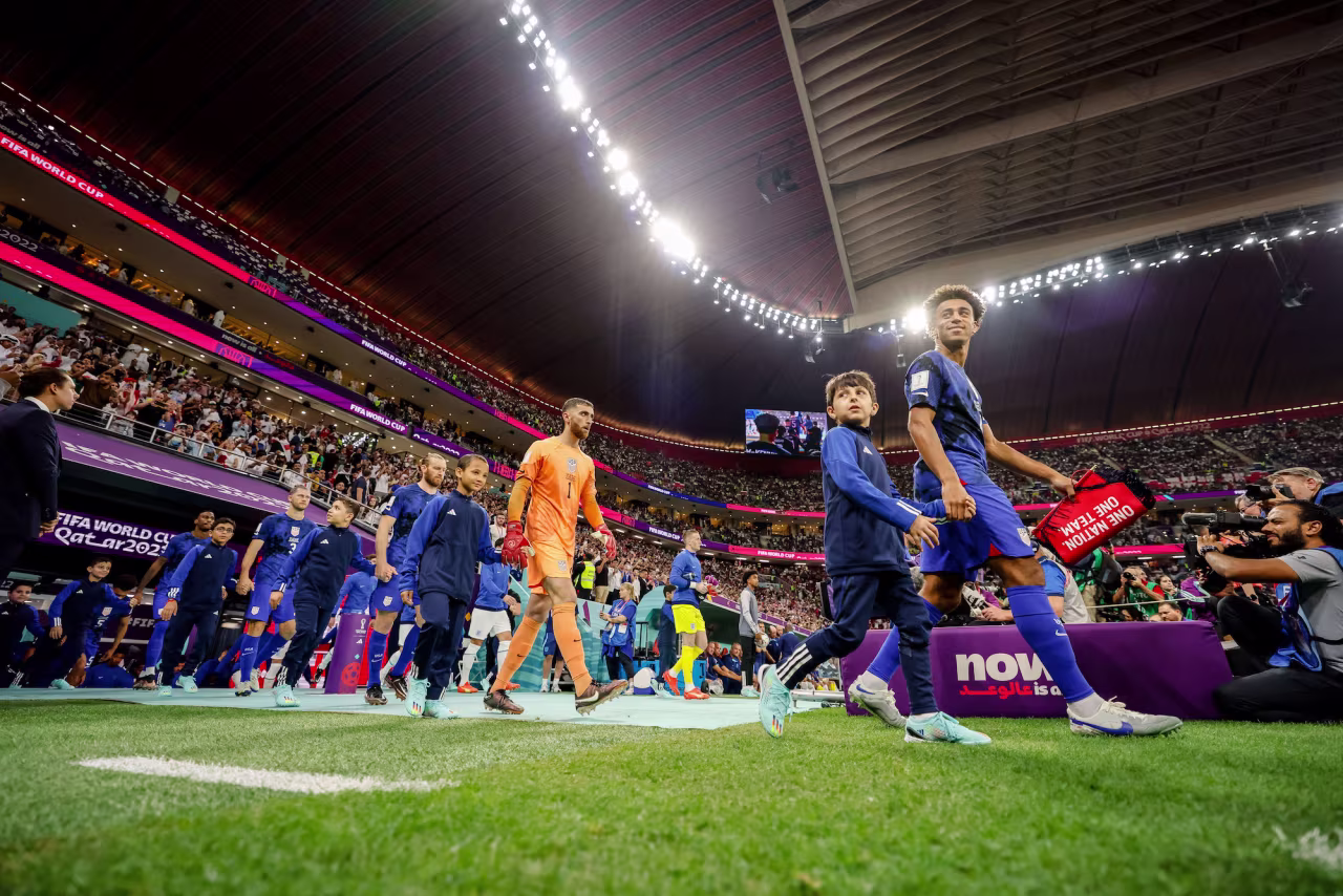 The United States team enters Al Bayt Stadium before facing England on Friday.