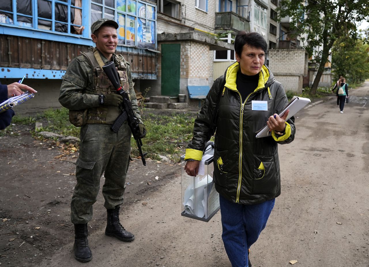 People cast their votes at a hospital in Donetsk Oblast, Ukraine, on September 24. The referendums on joining Russia are illegal under international law and dismissed as “a sham” by Western governments and Kyiv.