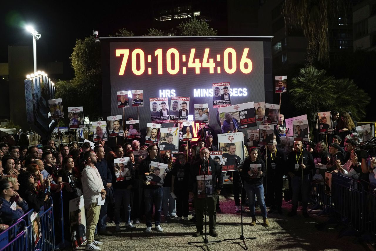 Family members of hostages being held in Gaza speak during a rally in Tel Aviv, Israel, on Saturday, December 16.