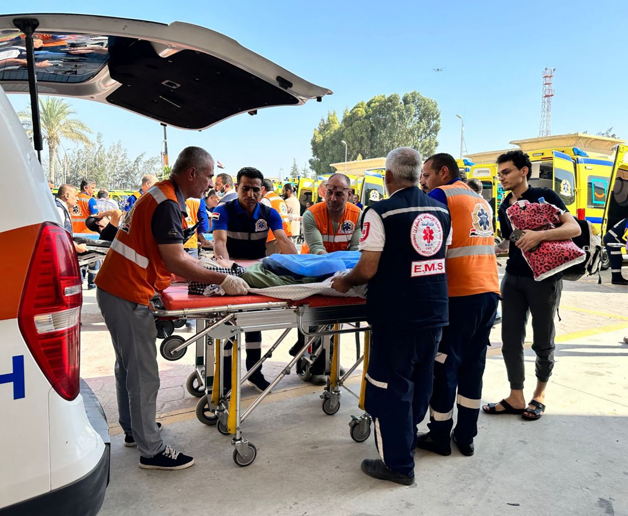 Egyptian paramedics transfer an injured Palestinian woman on the Egyptian side of the Rafah border in the north eastern Sinai province, Egypt, on November 7.