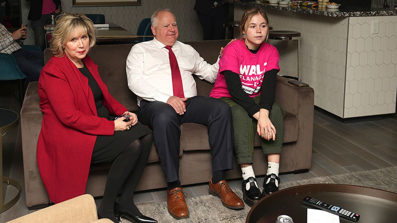 Walz watches election results with his wife, Gwen, left, and daughter, Hope, on Tuesday, November 8,  in St. Paul, Minnesota. 