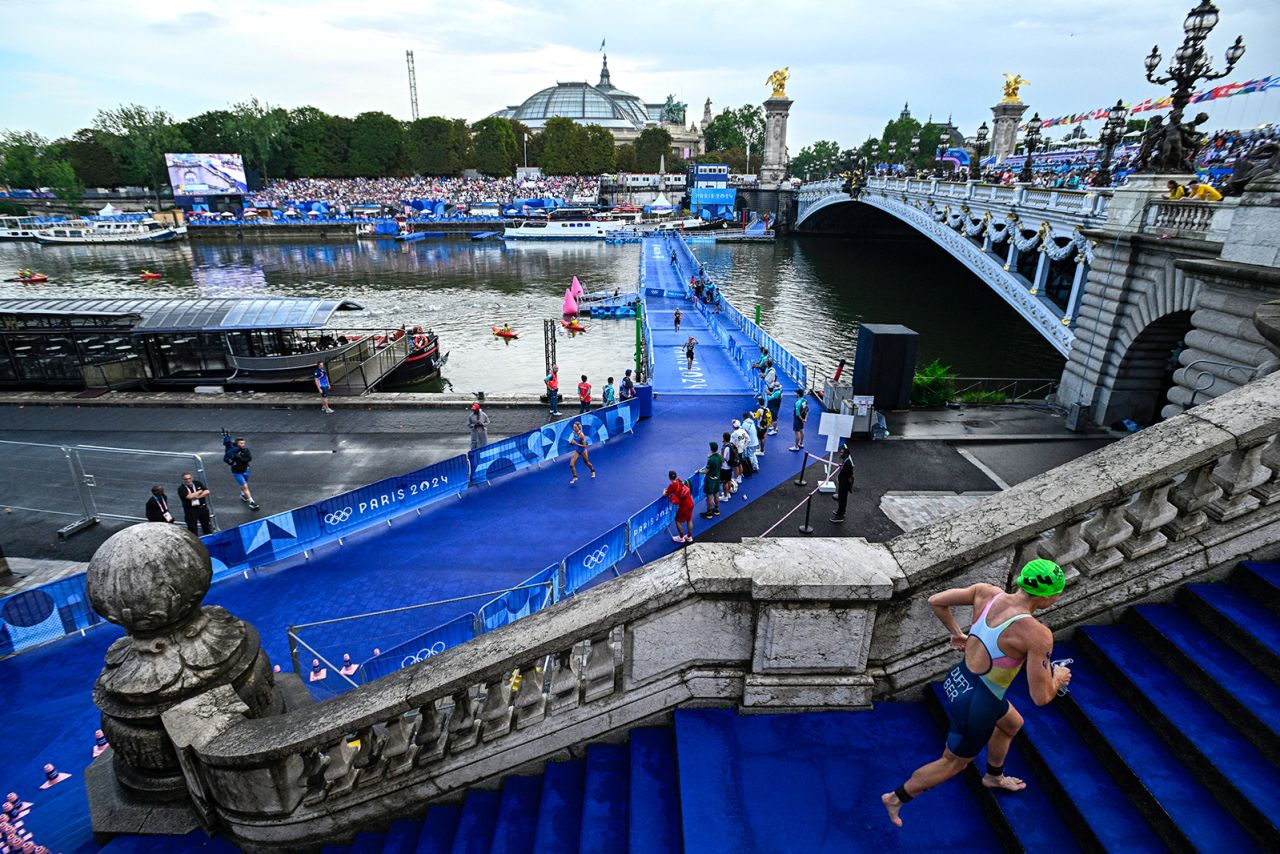 Bermuda's Flora Duffy (R) competes in the race during the women's individual triathlon at the Paris 2024 Olympic Games in Paris, France on July 31.