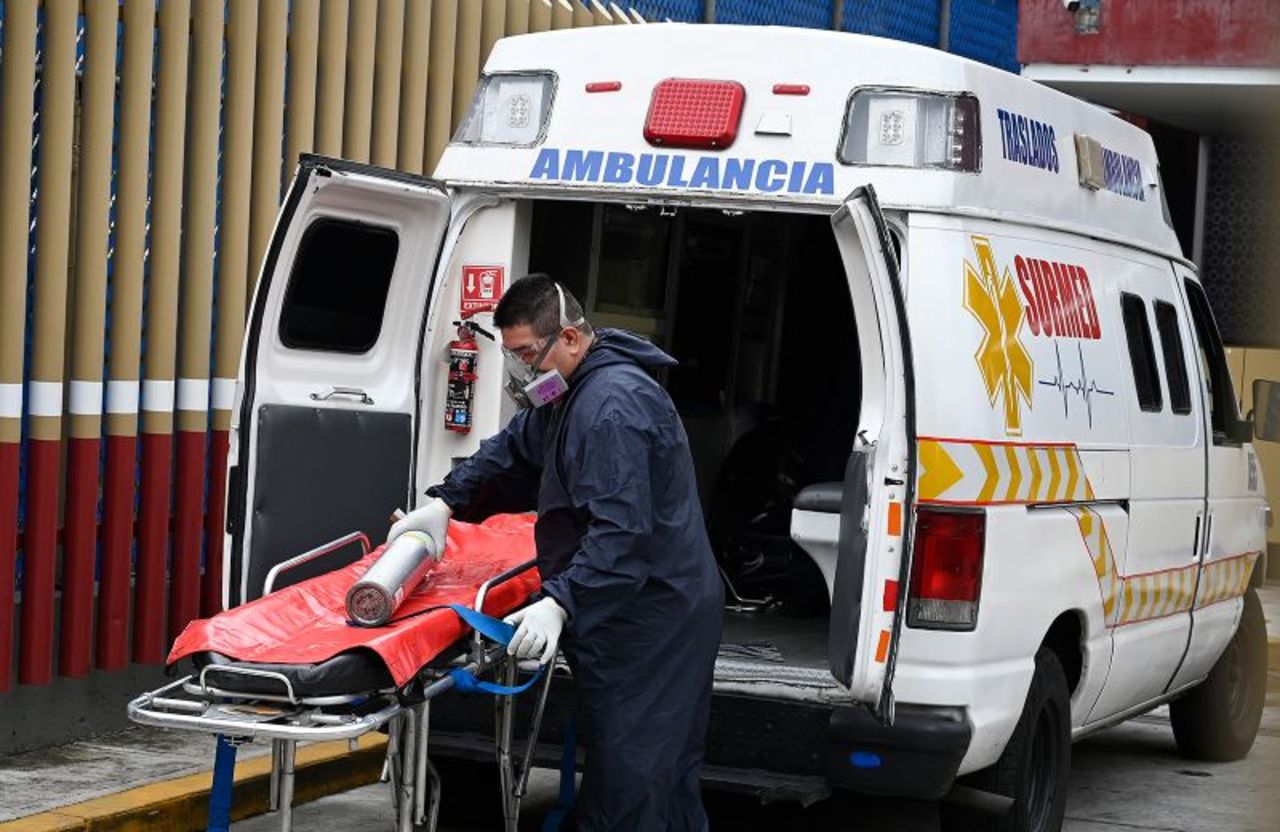 A paramedic prepares to move a patient at the Covid-19 triage area of the General Hospital in Mexico City on August 20.