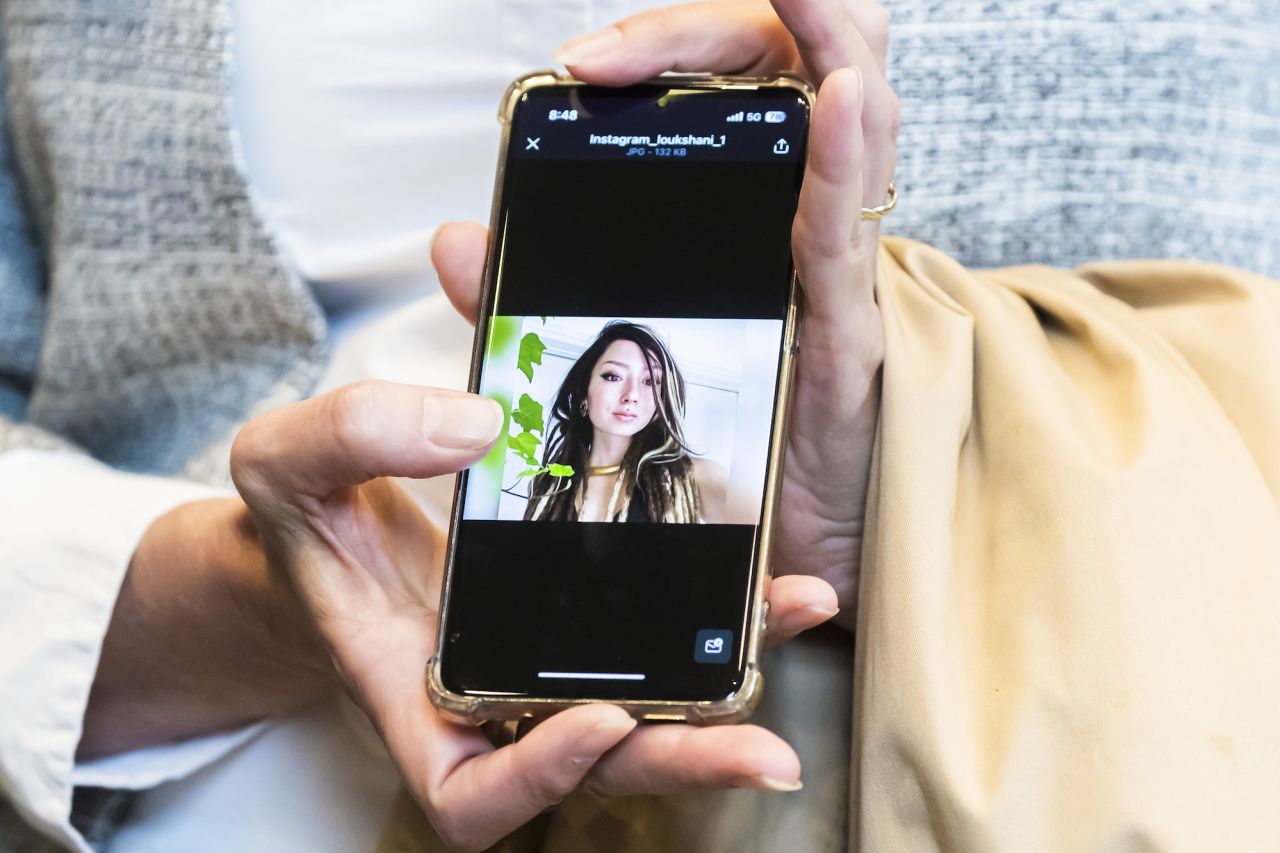 Ricarda Louk shows a photo of her daughter Shani Louk in Berlin on October 19.