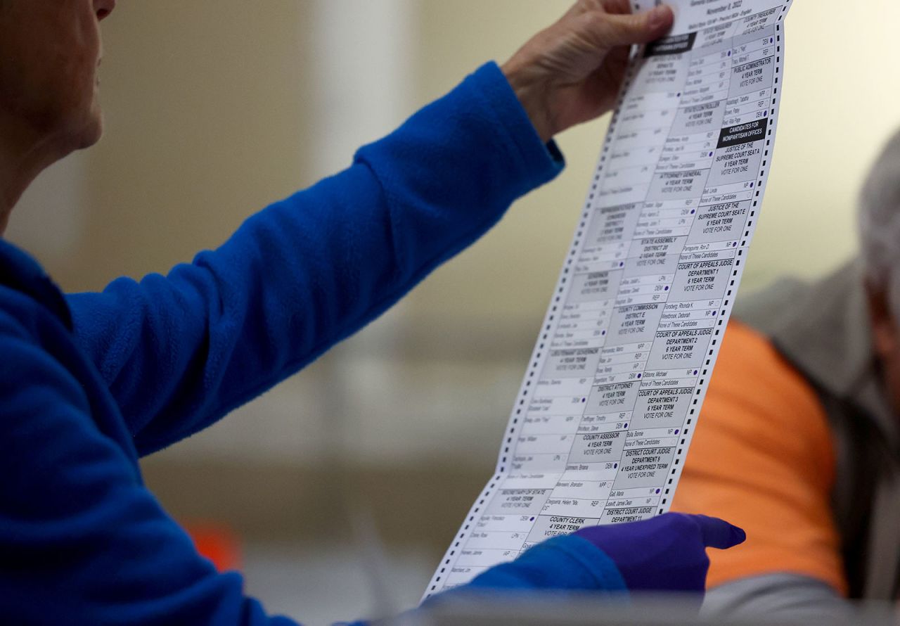 Ballots are processed by election workers at the Clark County Election Department on November 10 in North Las Vegas.