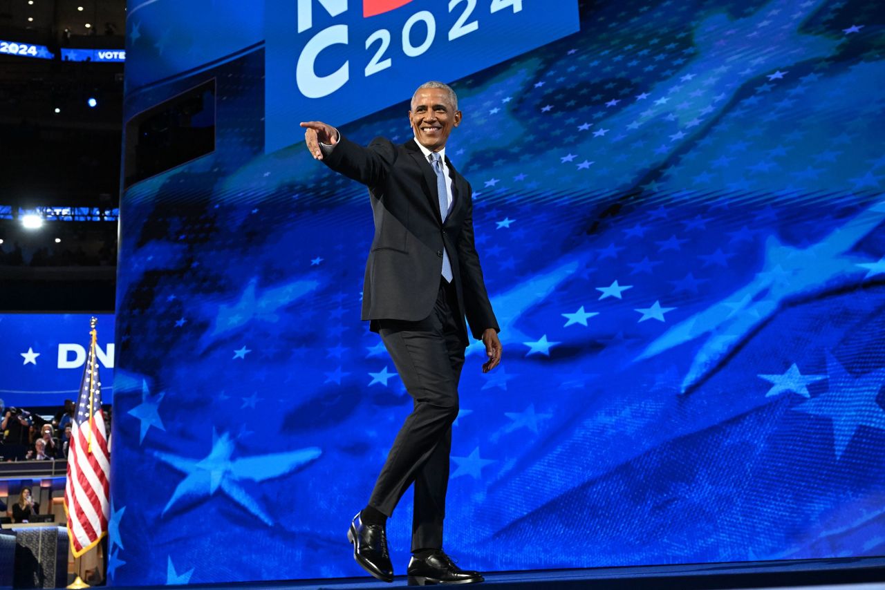 Former President Barack Obama walks off stage after speaking on August 20.