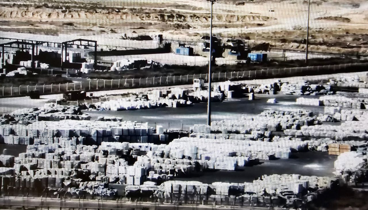 The Coordination of Government Activities in the Territories (COGAT) shared this image on X saying, "Currently, the content of 1,000 trucks is waiting on the Gazan side of Kerem Shalom to be picked up by @UN aid agencies."