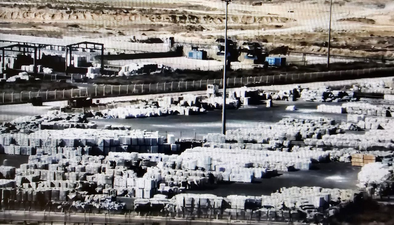 The Coordination of Government Activities in the Territories (COGAT) shared this image on X saying, "Currently, the content of 1,000 trucks is waiting on the Gazan side of Kerem Shalom to be picked up by @UN aid agencies."