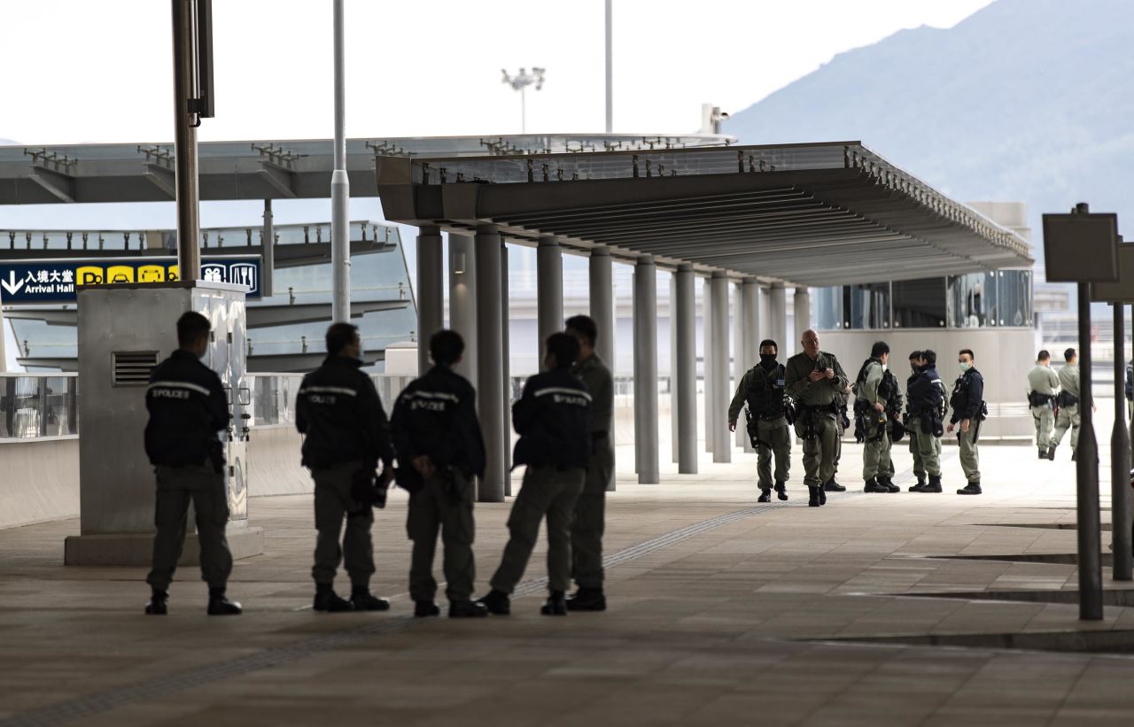 Police wear protective masks near the Hong Kong-Zhuhai-Macau Bridge on February 5.