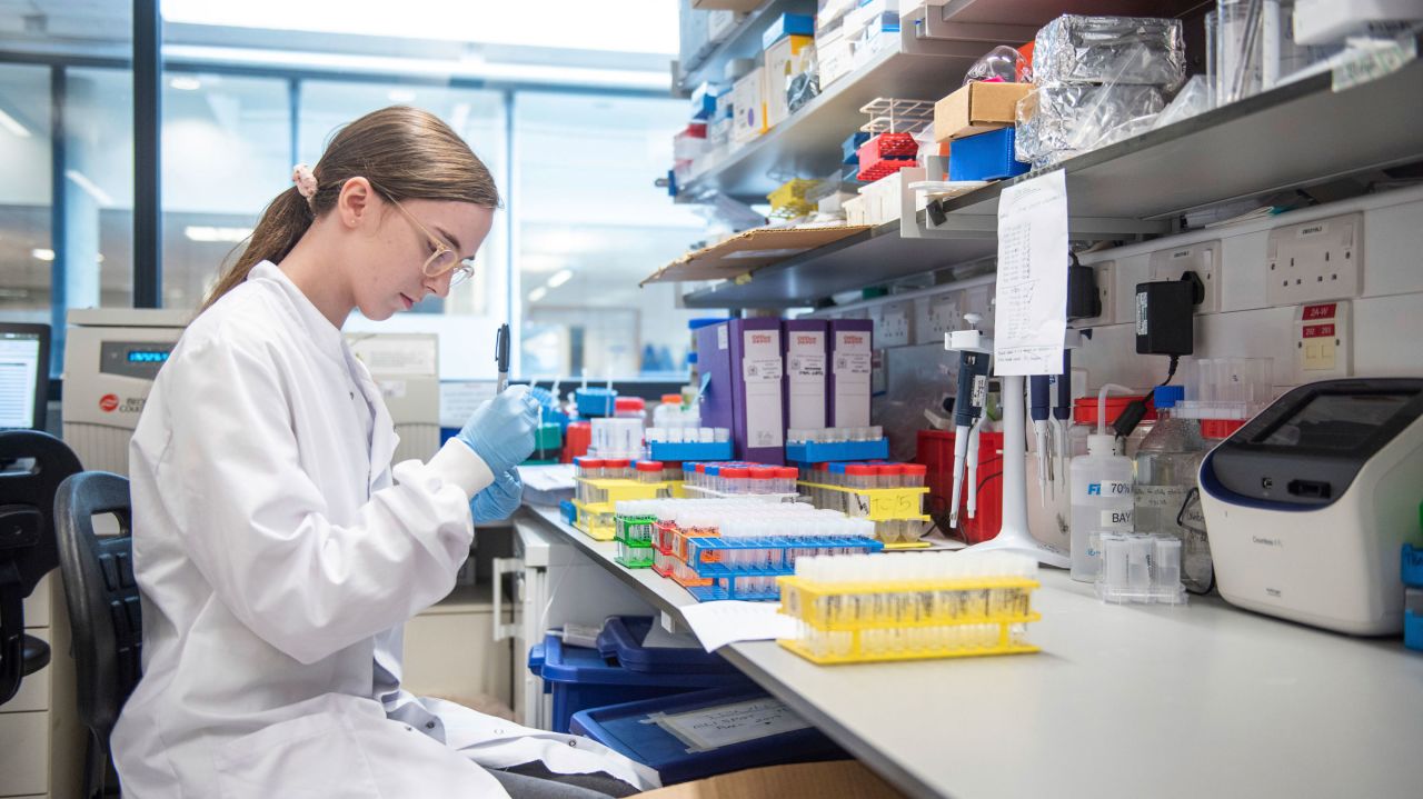 In this undated photo, a researcher in Oxford, England, works on the coronavirus vaccine developed by AstraZeneca and Oxford University.