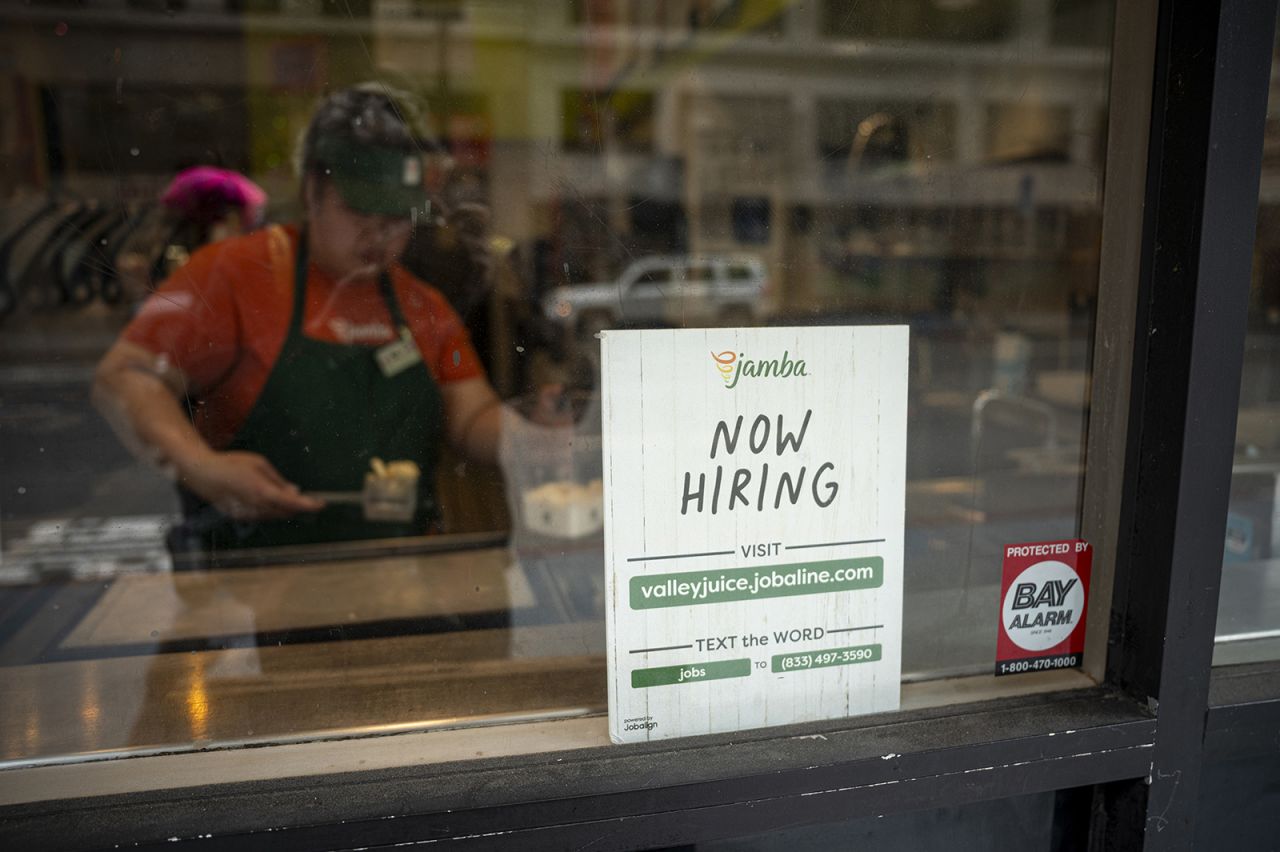 A "Now Hiring" sign shown at a business in San Francisco, California, on June 26.