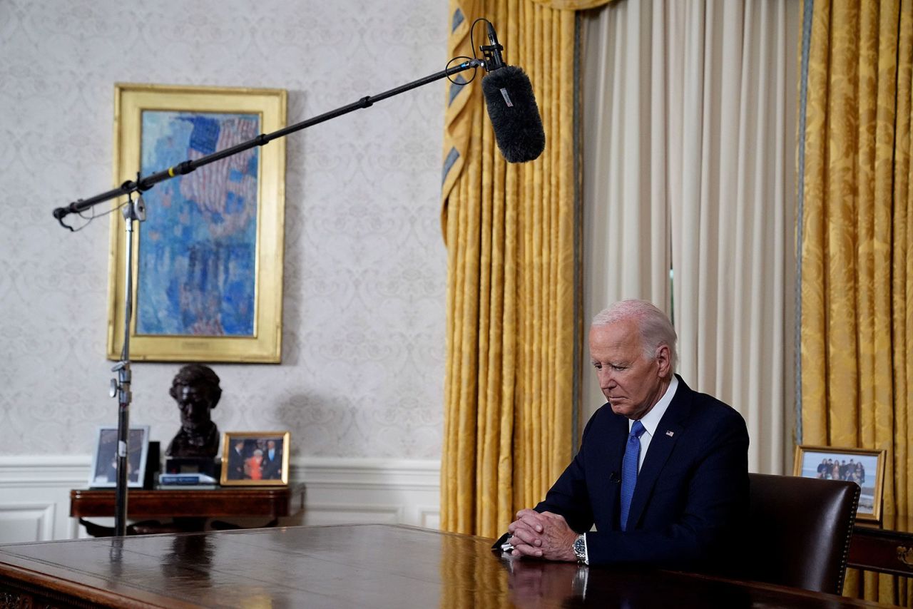 President Joe Biden pauses before he addresses the nation from the Oval Office of the White House in Washington,DC, on Wednesday, July 24, about his decision to drop his Democratic presidential reelection bid. 