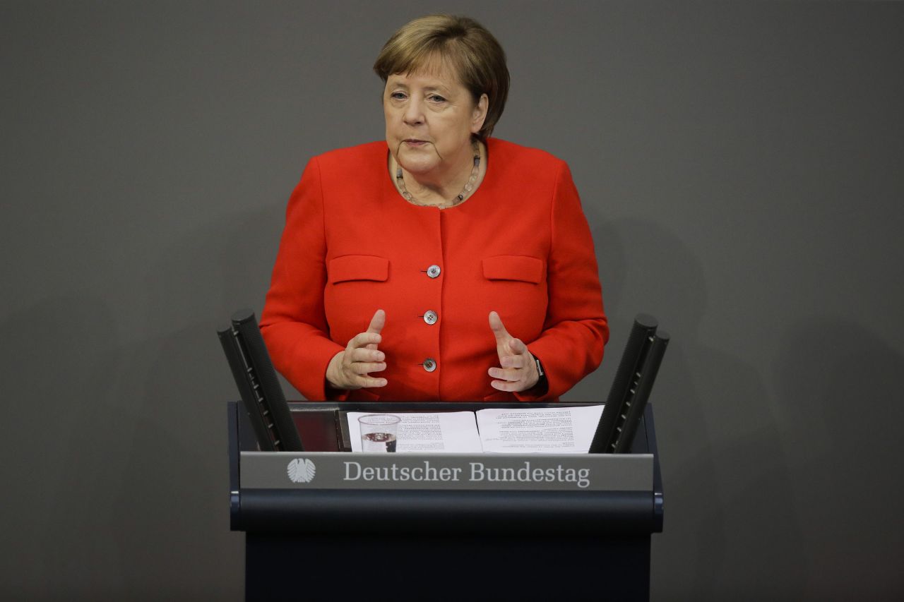 German Chancellor Angela Merkel addresses parliament in Berlin, Germany, on Thursday, June 18.